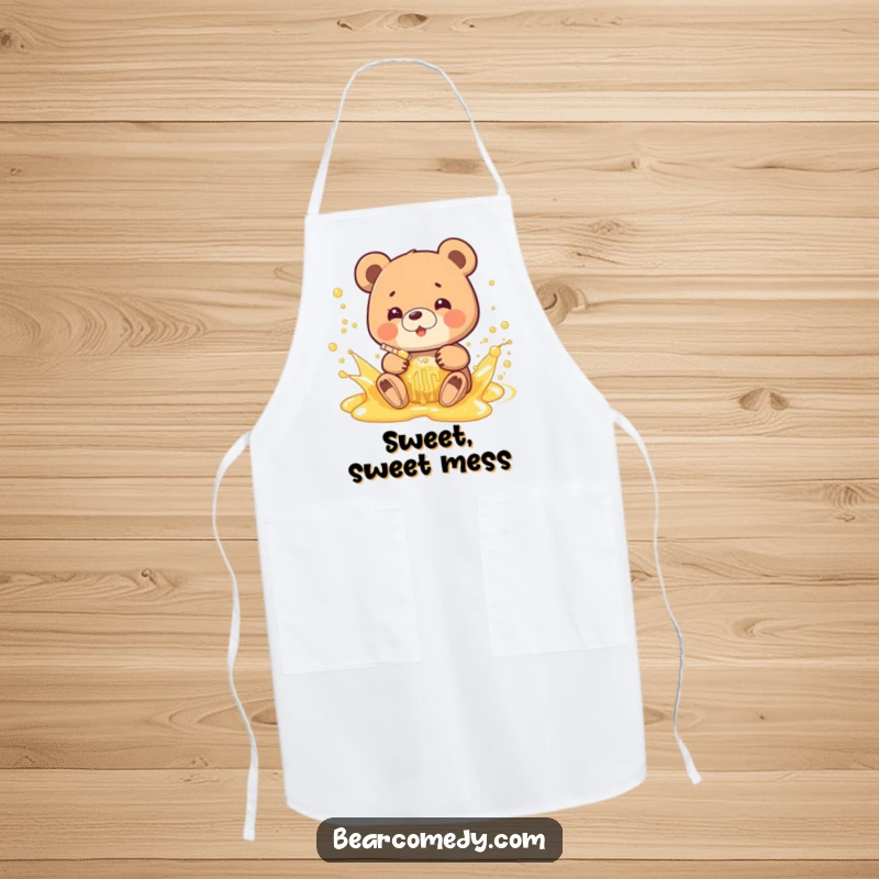 Funny apron design featuring a bear joyfully splashing in a bubbly stream of honey, perfect for a sweet cooking experience.
