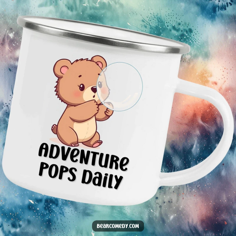 Funny camping mug featuring a bear cub playfully batting at a large, bouncing bubble, perfect for enjoying beverages during outdoor fun.