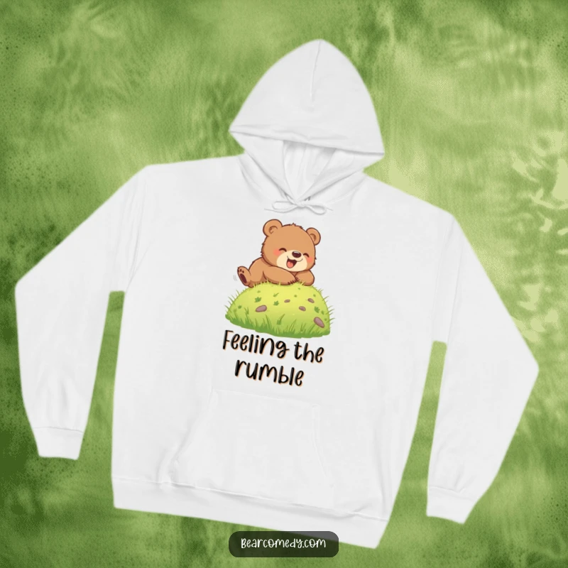 Funny hoodie depicting a joyful bear cub tumbling down a grassy hill, radiating pure exhilaration and playful energy, great for cozy days.